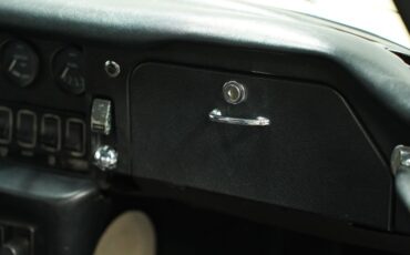 Unknown-E-type-1968-Pale-Primrose-Black-45