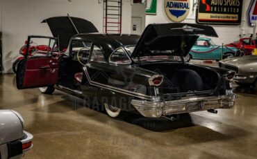 Unknown-Golden-rocket-88-1957-Black-Red-1