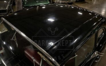 Unknown-Golden-rocket-88-1957-Black-Red-10