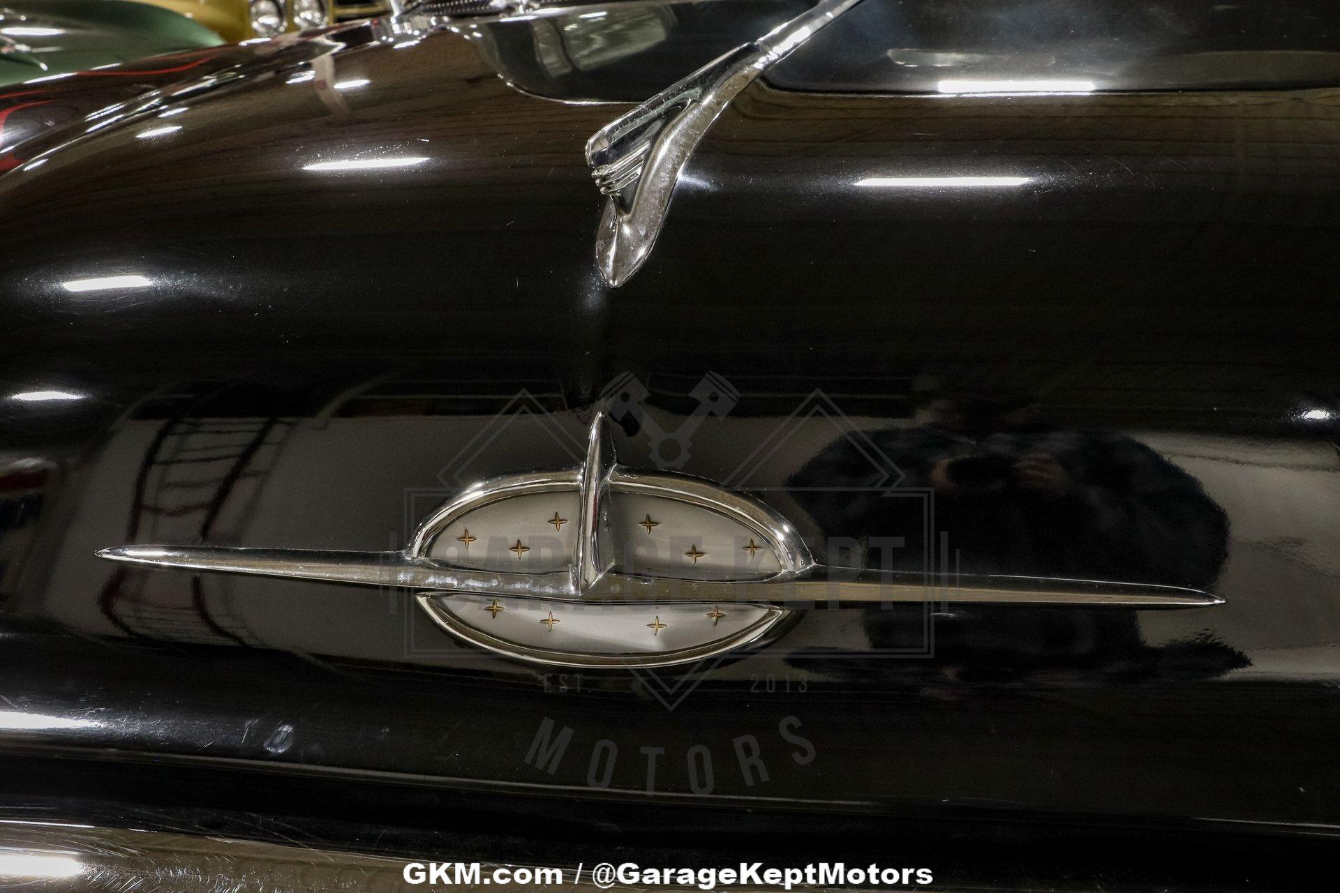Unknown-Golden-rocket-88-1957-Black-Red-11