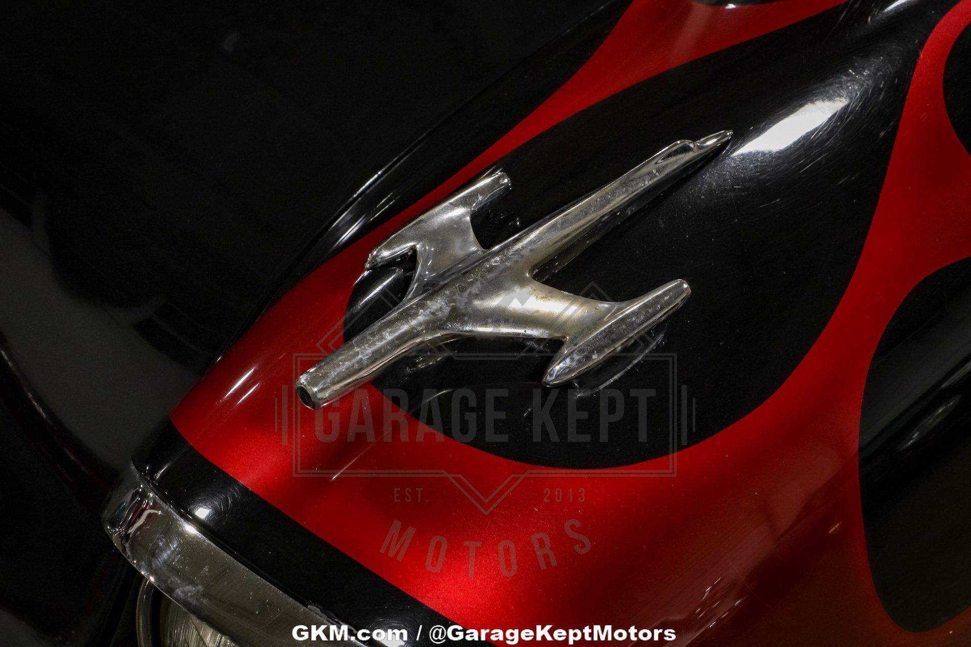 Unknown-Golden-rocket-88-1957-Black-Red-12