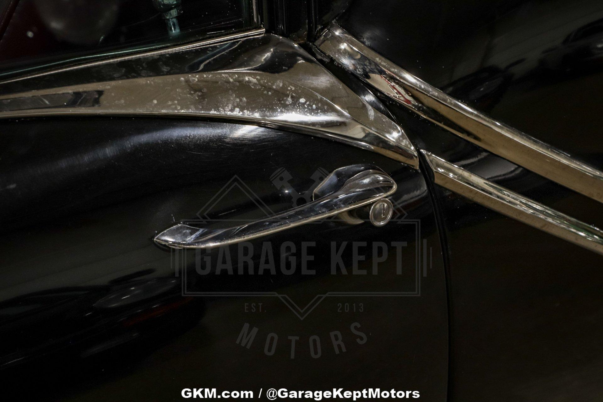 Unknown-Golden-rocket-88-1957-Black-Red-13