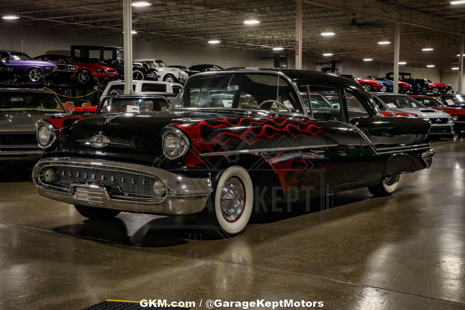 Unknown-Golden-rocket-88-1957-Black-Red-14