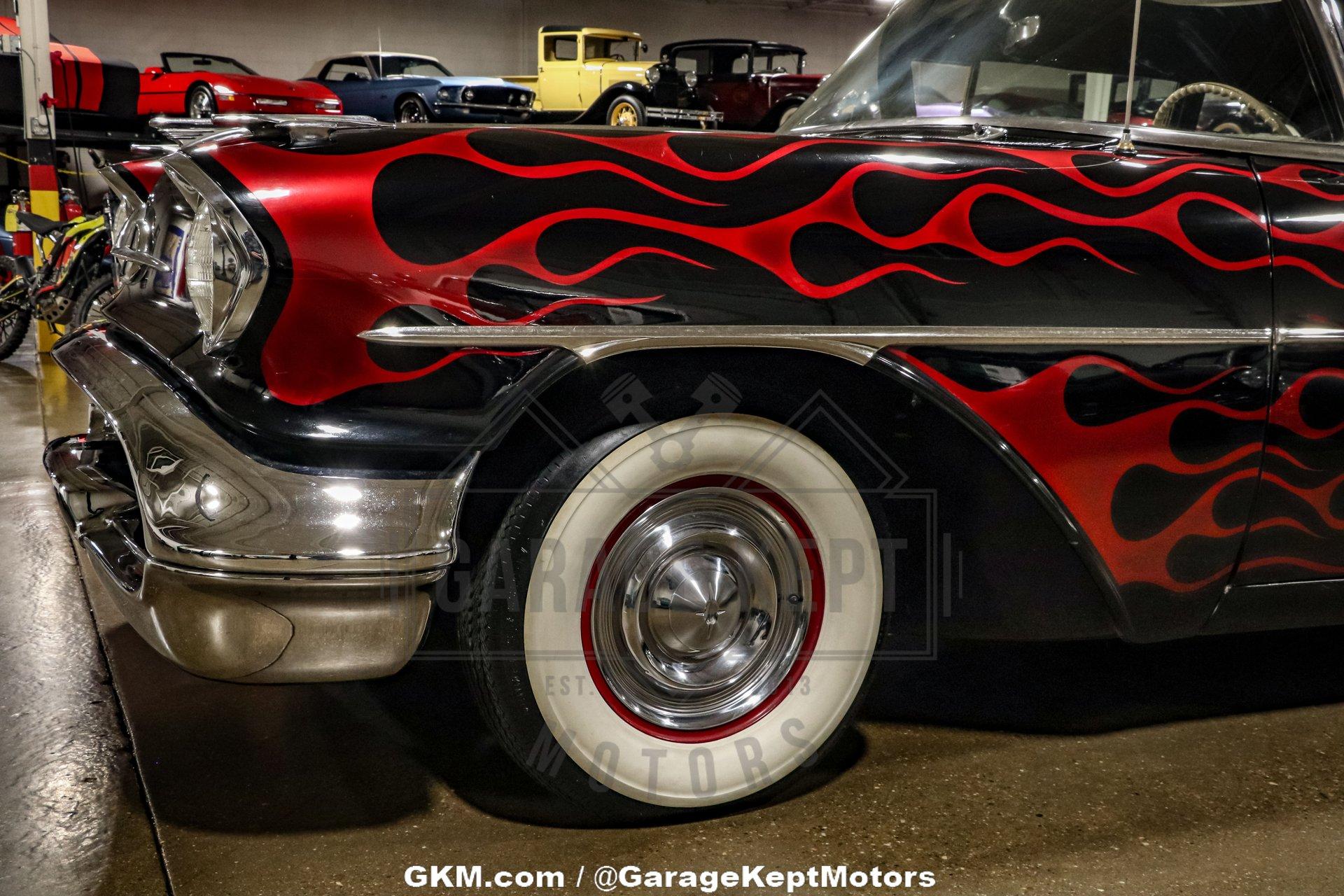 Unknown-Golden-rocket-88-1957-Black-Red-15