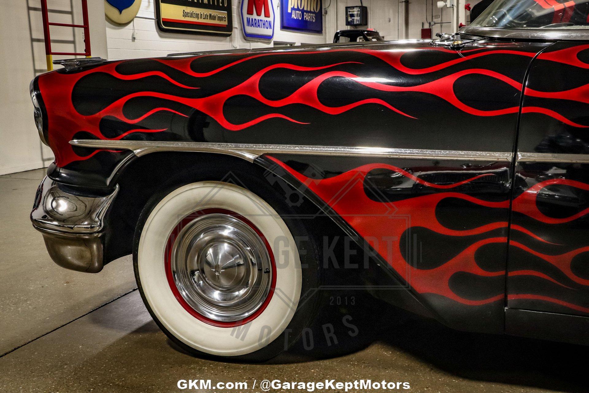 Unknown-Golden-rocket-88-1957-Black-Red-16
