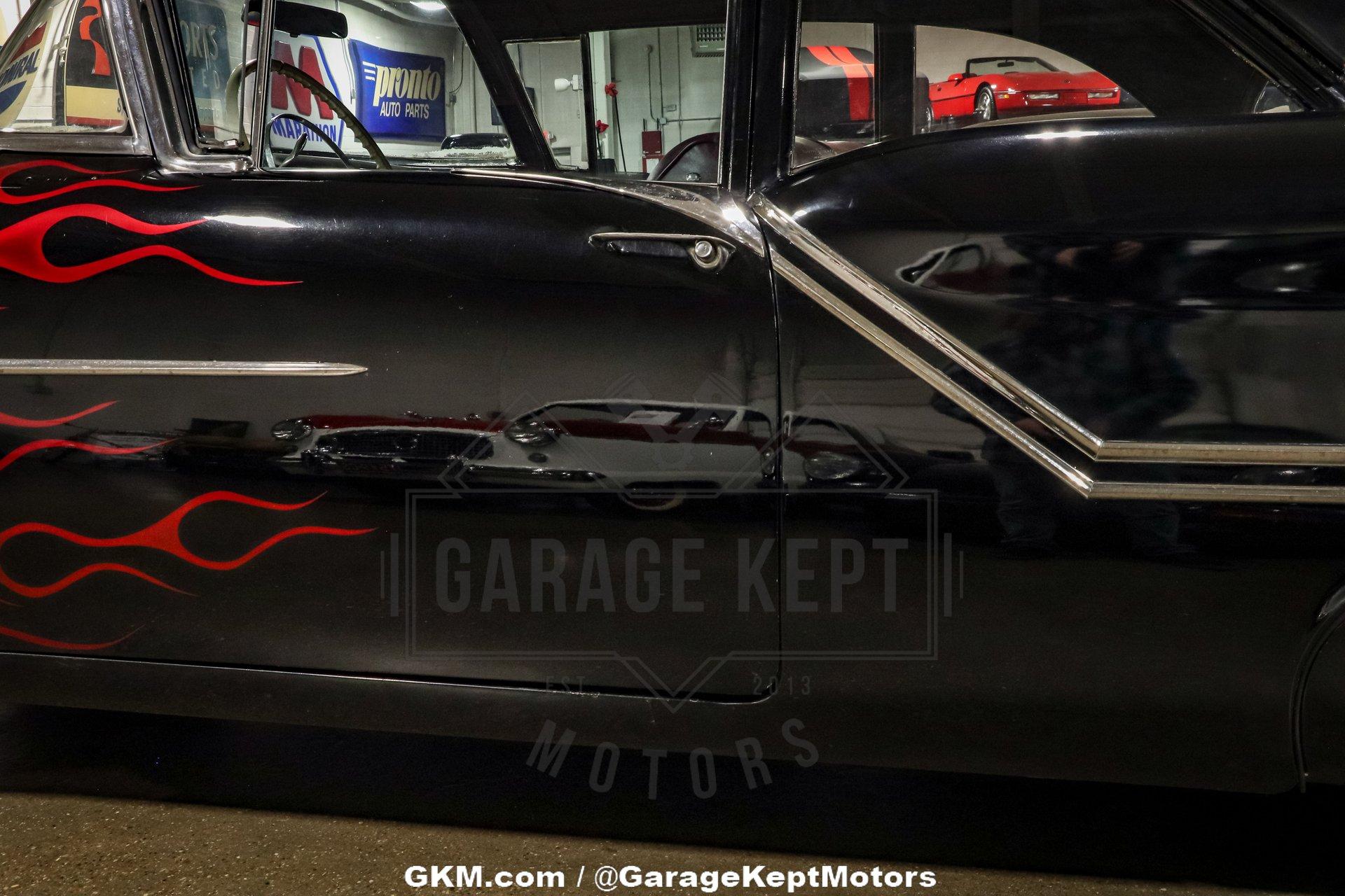 Unknown-Golden-rocket-88-1957-Black-Red-18