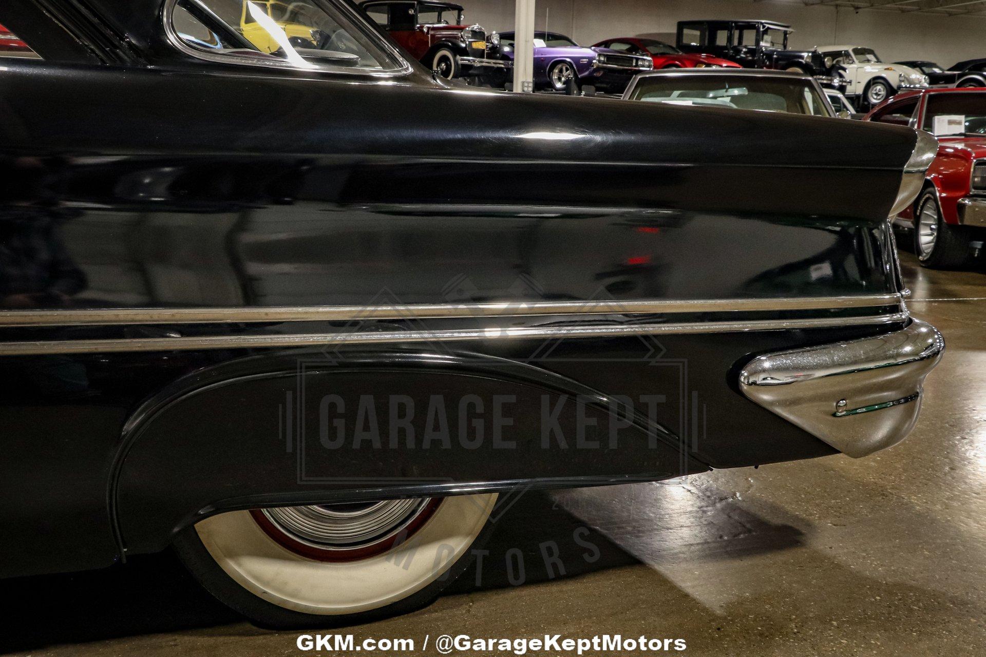 Unknown-Golden-rocket-88-1957-Black-Red-19