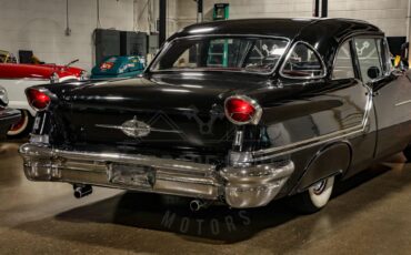 Unknown-Golden-rocket-88-1957-Black-Red-23