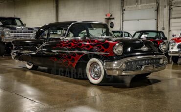 Unknown-Golden-rocket-88-1957-Black-Red-27