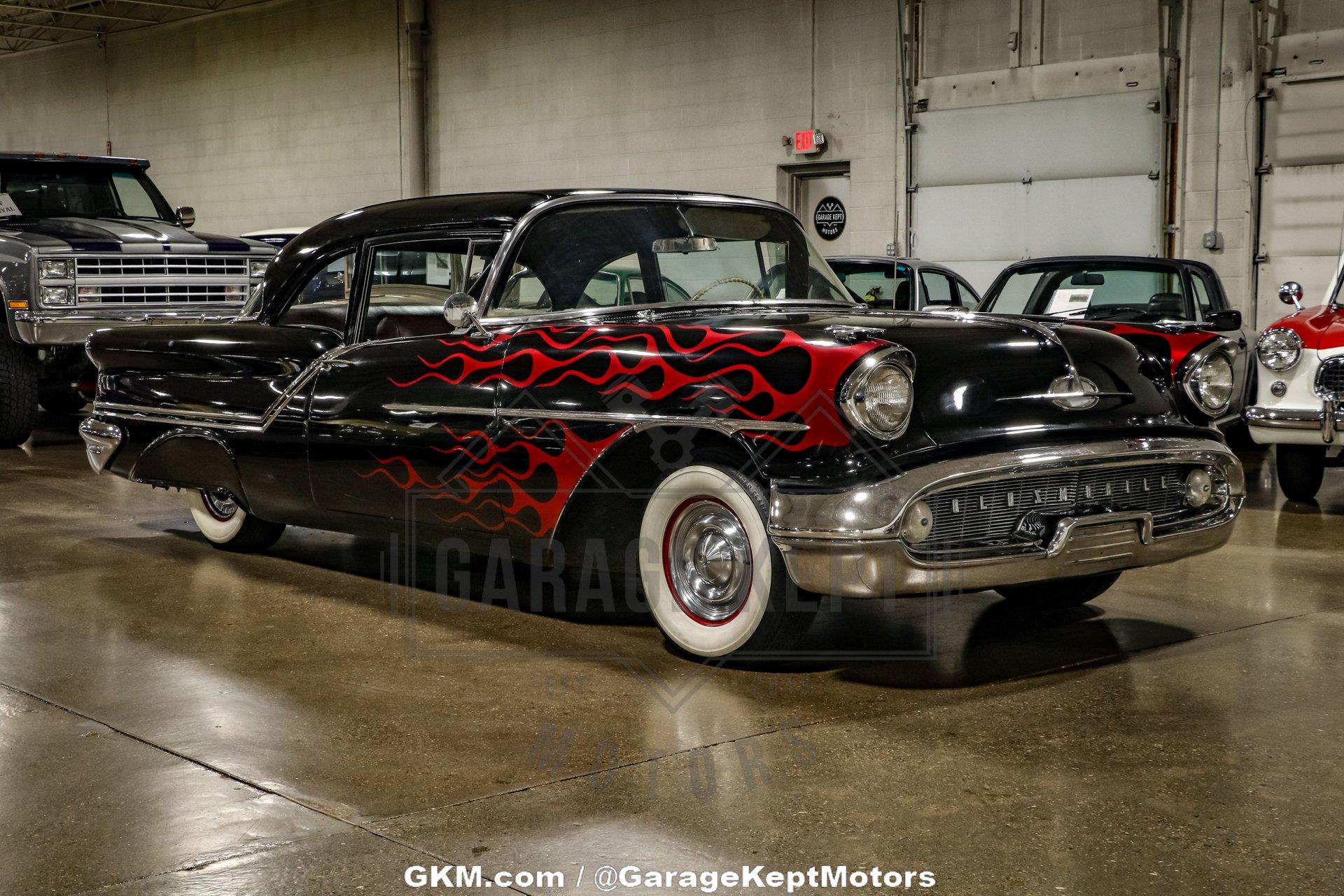 Unknown-Golden-rocket-88-1957-Black-Red-27