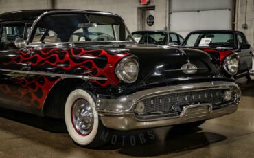 Unknown-Golden-rocket-88-1957-Black-Red-28