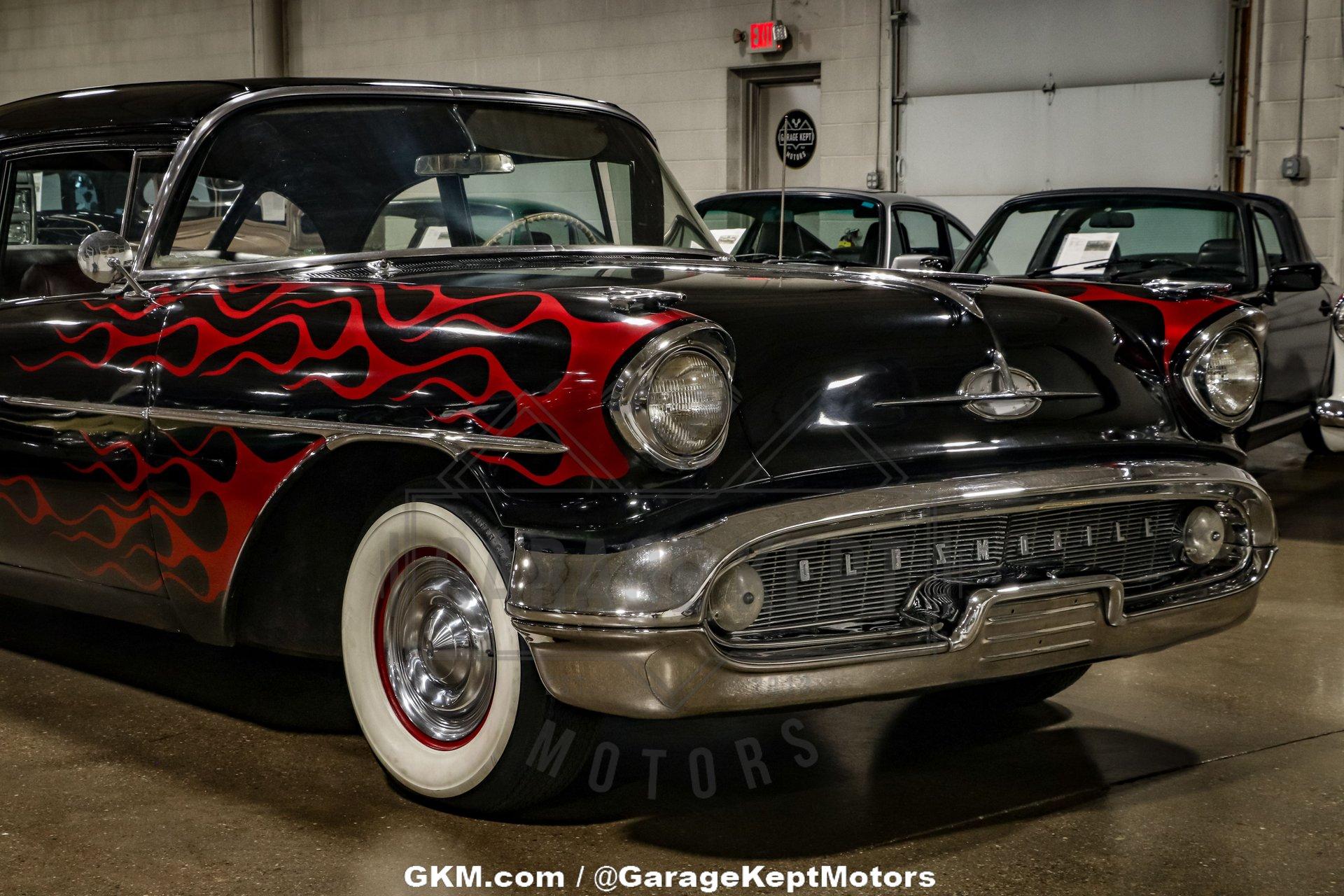 Unknown-Golden-rocket-88-1957-Black-Red-28