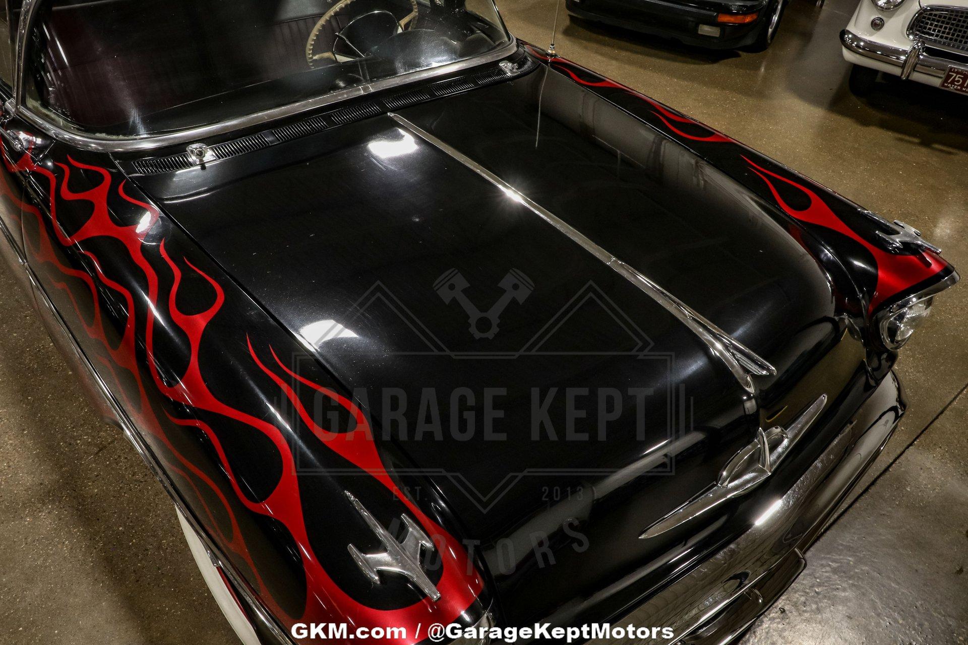 Unknown-Golden-rocket-88-1957-Black-Red-29