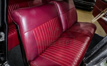 Unknown-Golden-rocket-88-1957-Black-Red-3