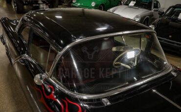 Unknown-Golden-rocket-88-1957-Black-Red-30