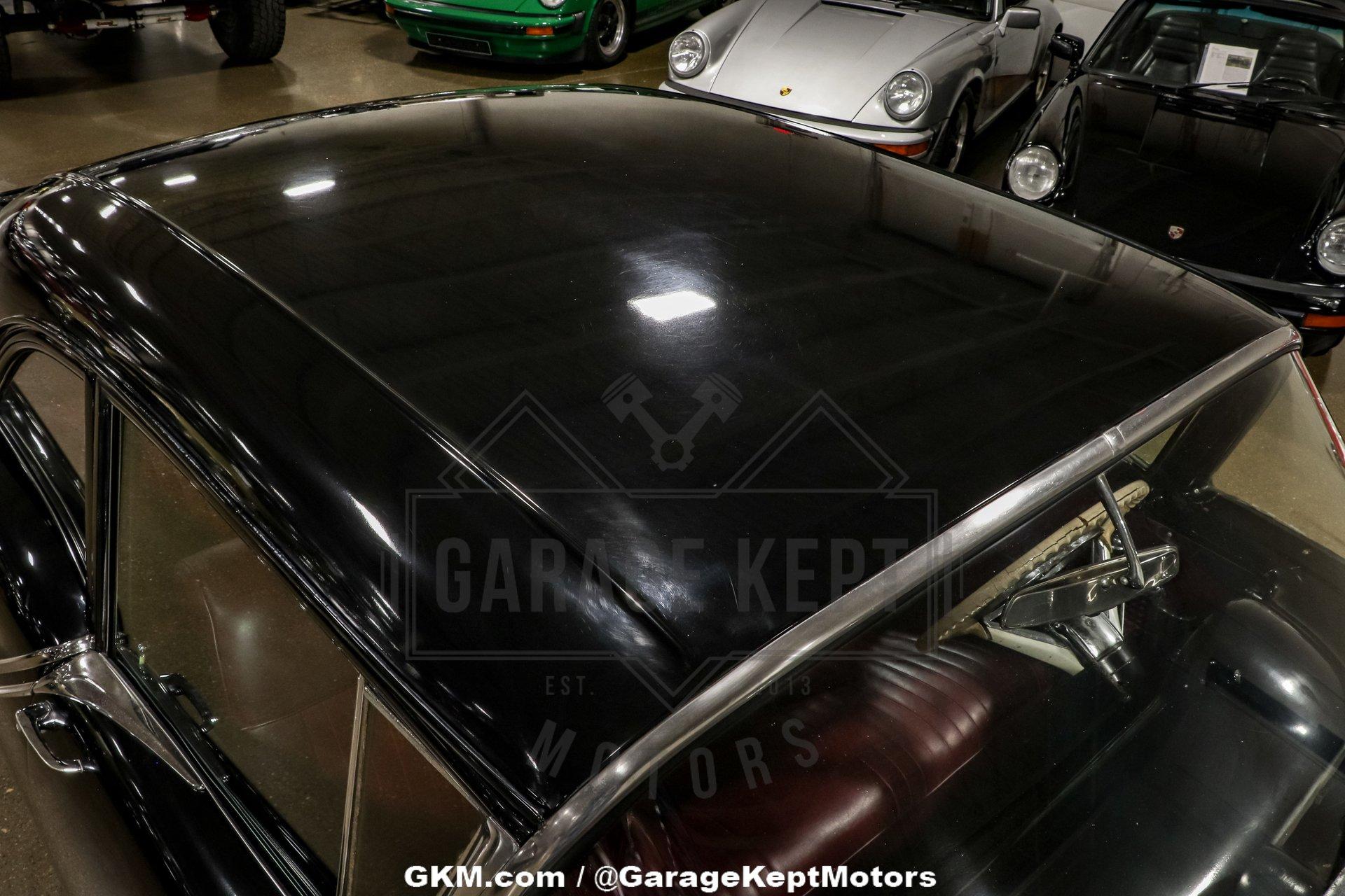 Unknown-Golden-rocket-88-1957-Black-Red-31