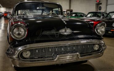 Unknown-Golden-rocket-88-1957-Black-Red-32