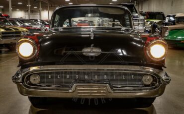 Unknown-Golden-rocket-88-1957-Black-Red-35