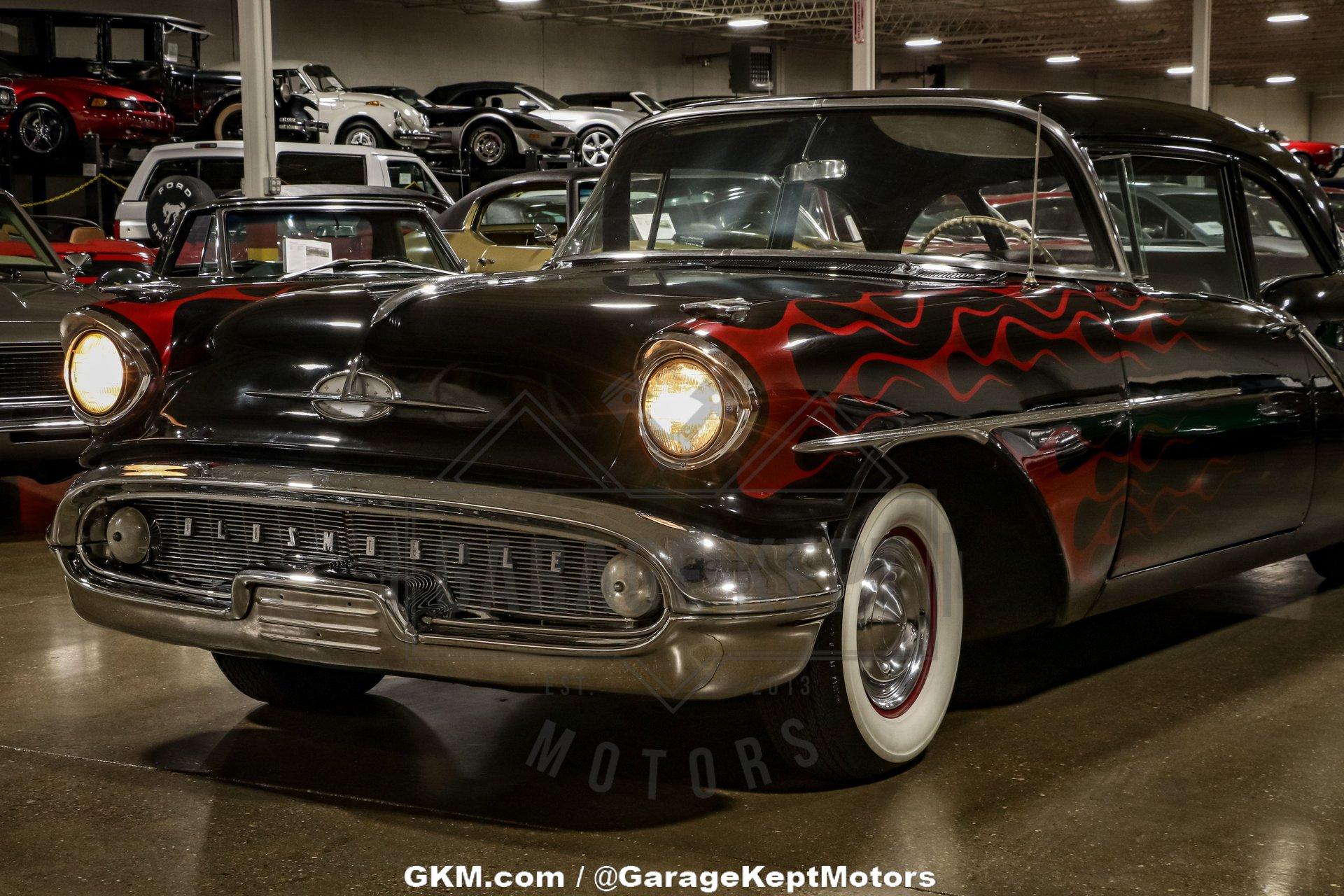 Unknown-Golden-rocket-88-1957-Black-Red-36
