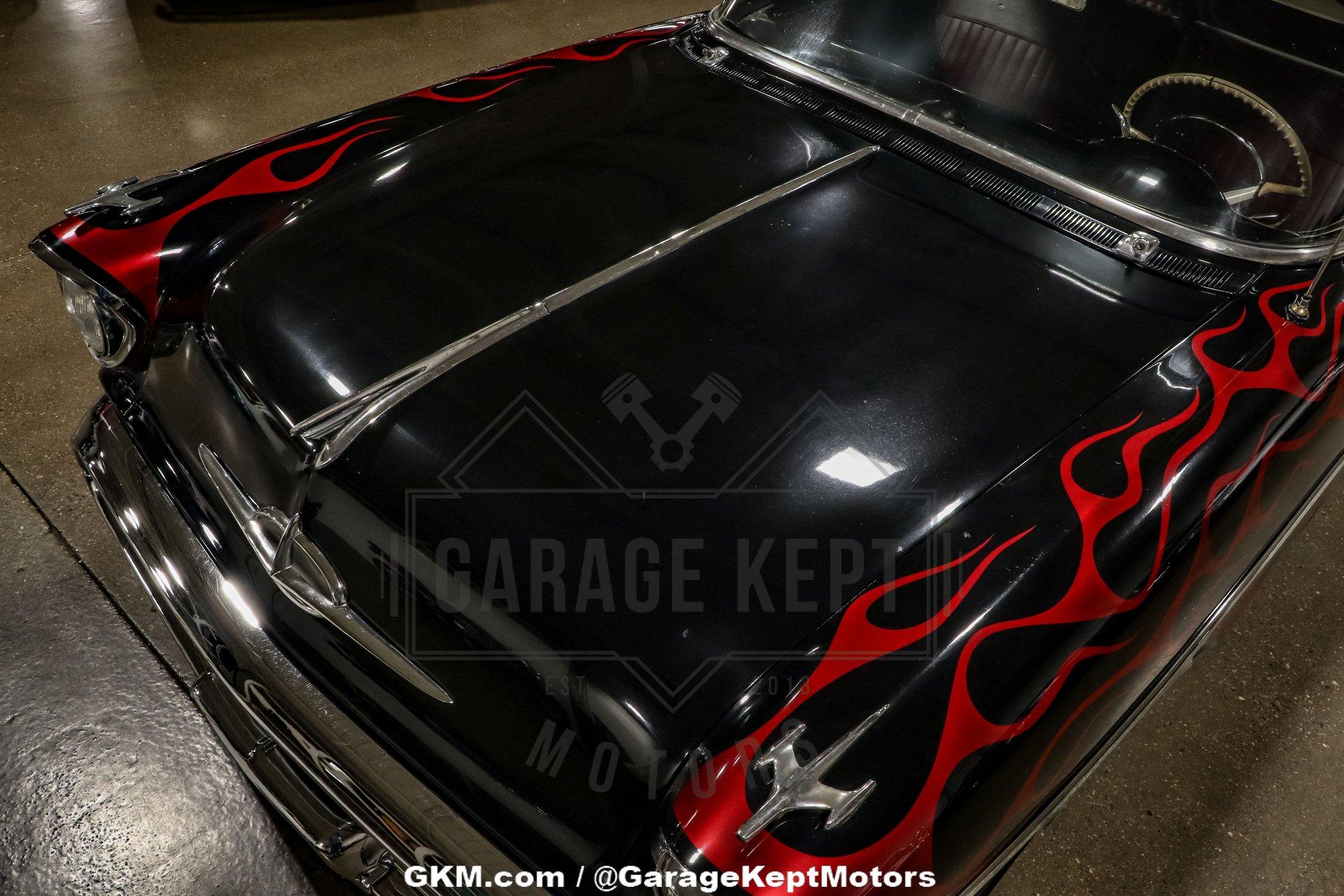Unknown-Golden-rocket-88-1957-Black-Red-38