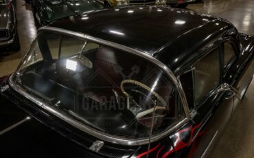 Unknown-Golden-rocket-88-1957-Black-Red-39