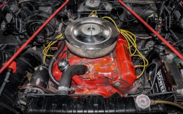 Unknown-Golden-rocket-88-1957-Black-Red-4