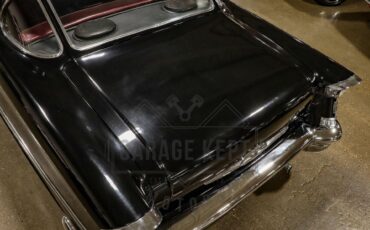 Unknown-Golden-rocket-88-1957-Black-Red-41