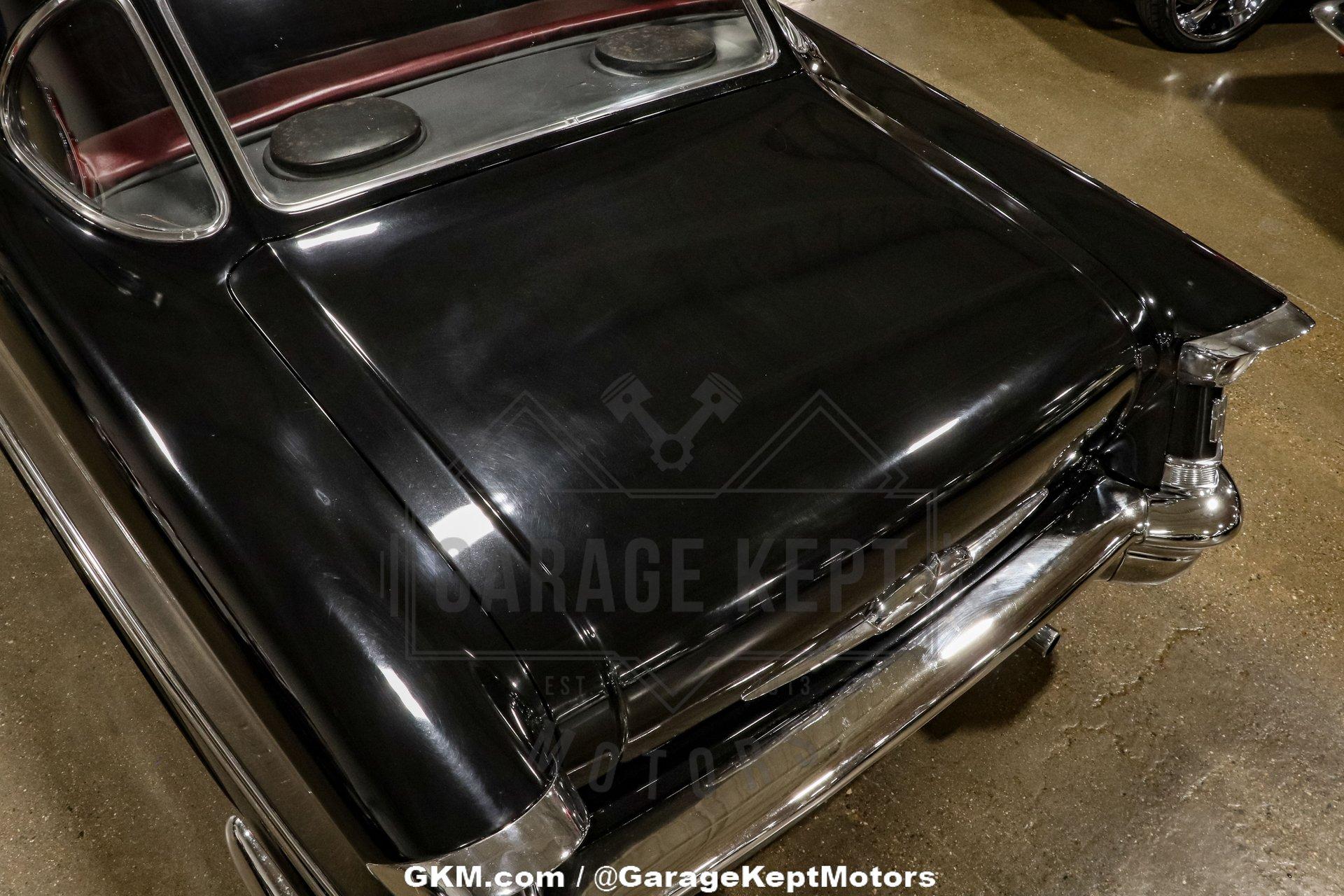 Unknown-Golden-rocket-88-1957-Black-Red-41