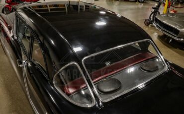 Unknown-Golden-rocket-88-1957-Black-Red-42