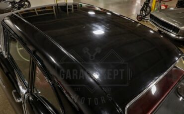 Unknown-Golden-rocket-88-1957-Black-Red-43