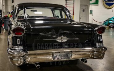 Unknown-Golden-rocket-88-1957-Black-Red-46
