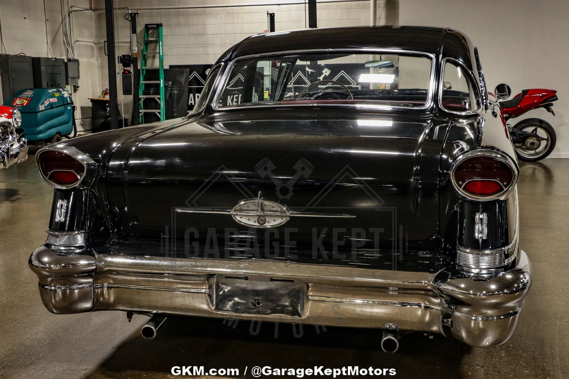 Unknown-Golden-rocket-88-1957-Black-Red-47