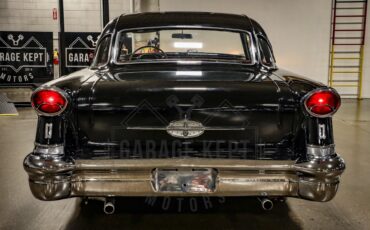 Unknown-Golden-rocket-88-1957-Black-Red-49