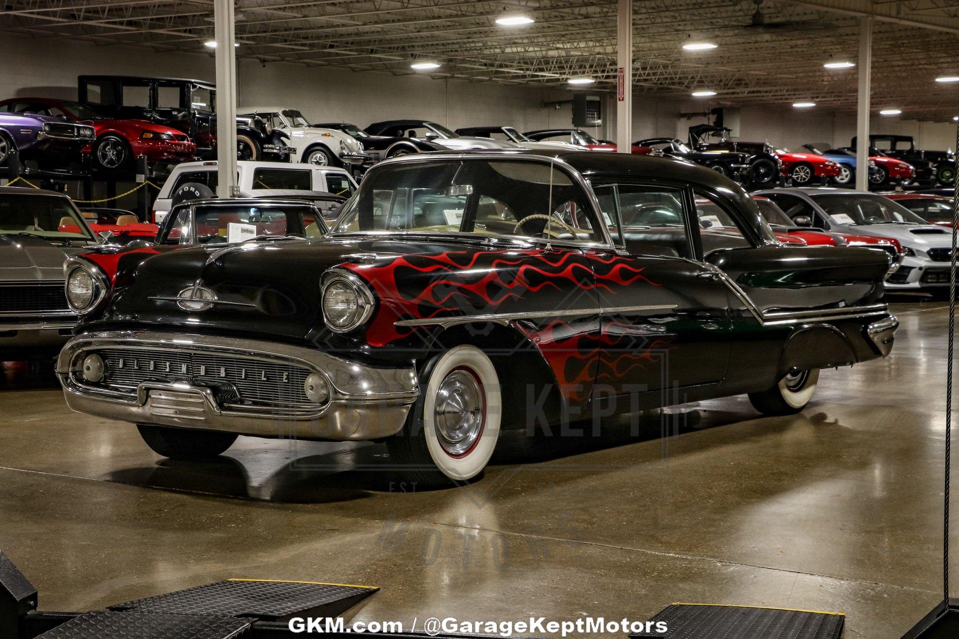 Unknown-Golden-rocket-88-1957-Black-Red-6