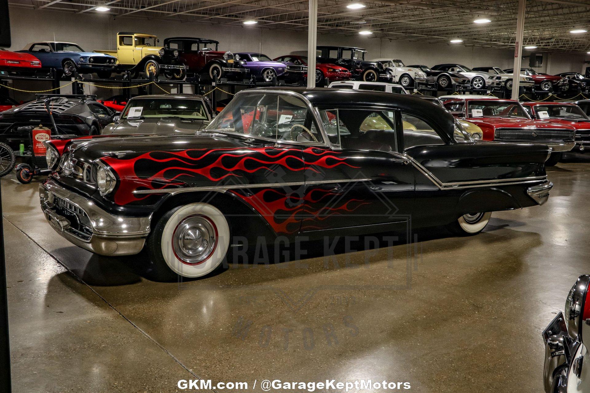 Unknown-Golden-rocket-88-1957-Black-Red-7
