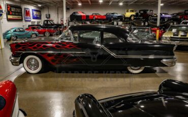 Unknown-Golden-rocket-88-1957-Black-Red-8