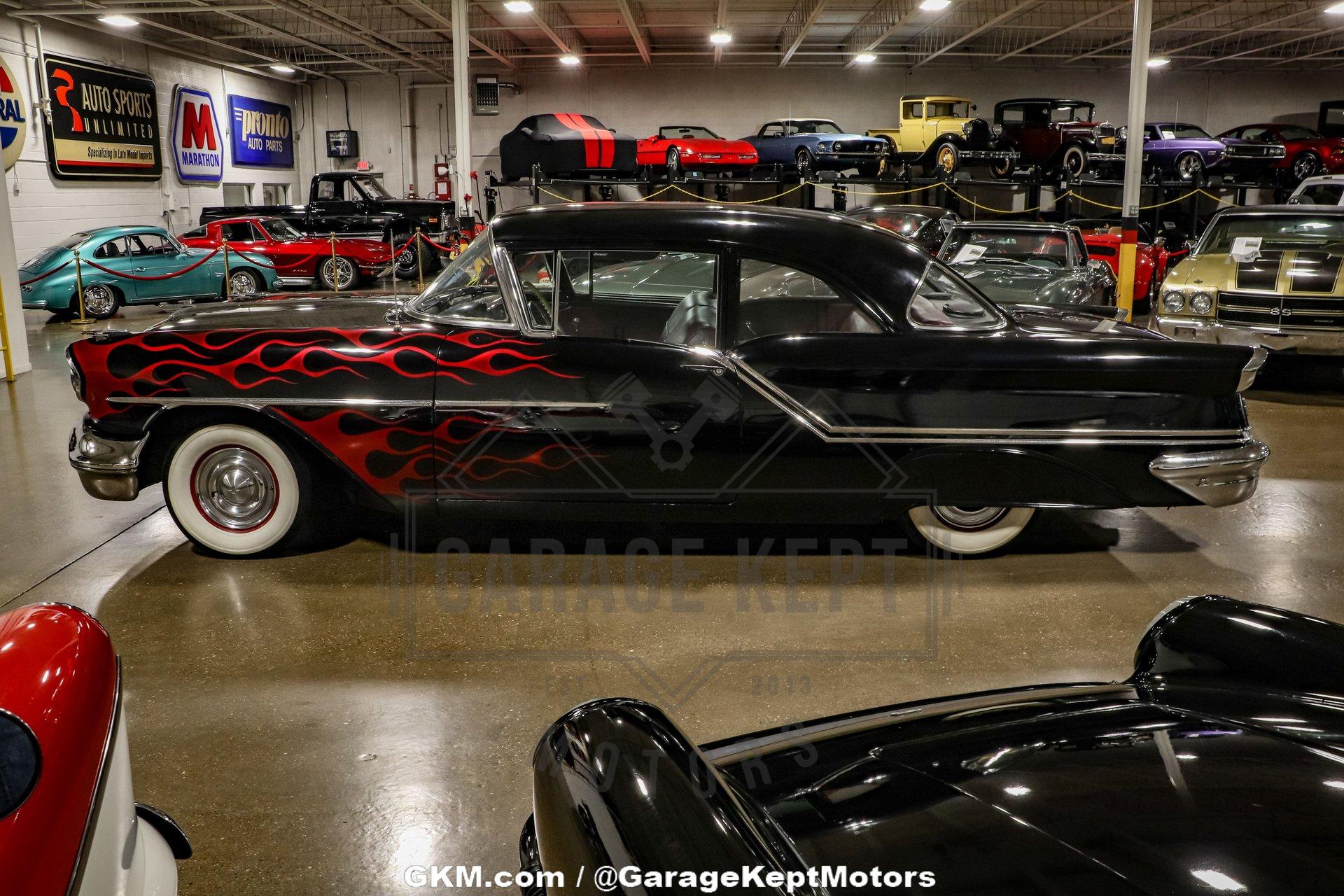 Unknown-Golden-rocket-88-1957-Black-Red-8