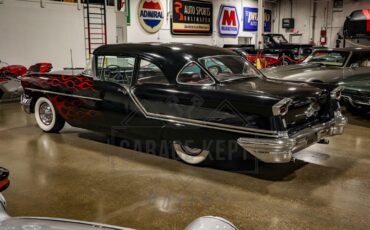 Unknown-Golden-rocket-88-1957-Black-Red-9