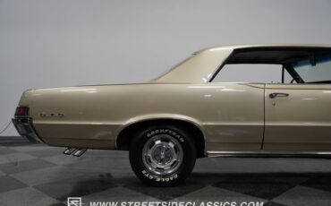 Unknown-Gto-1965-Capri-gold-Black-21