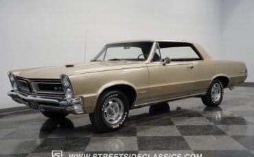 Unknown-Gto-1965-Capri-gold-Black-3