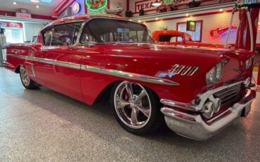 Unknown-Impala-1958-Red-Tan