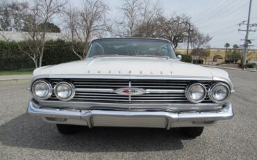 Unknown-Impala-1960-Ermine-White-Red-1