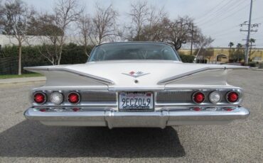 Unknown-Impala-1960-Ermine-White-Red-2