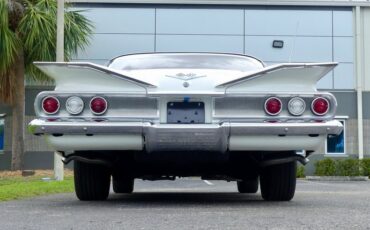 Unknown-Impala-1960-Ermine-White-Red-24