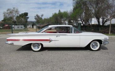 Unknown-Impala-1960-Ermine-White-Red-3