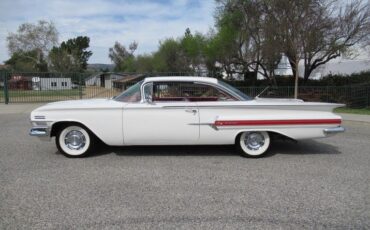 Unknown-Impala-1960-Ermine-White-Red