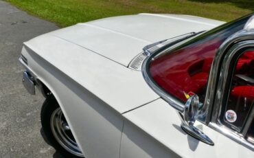 Unknown-Impala-1960-Ermine-White-Red-48