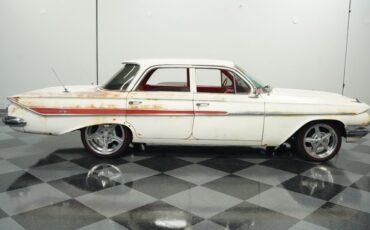 Unknown-Impala-1961-Patina-Red-ampamp-White-22