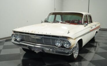 Unknown-Impala-1961-Patina-Red-ampamp-White-24