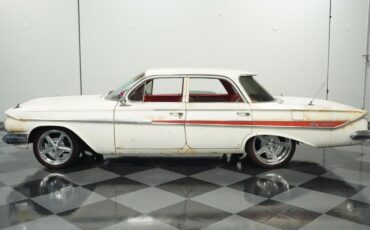 Unknown-Impala-1961-Patina-Red-ampamp-White
